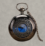 BKB Custom Gifts blue ornate pocket watch in alloy metal with intricate filigree cover and Roman numeral dial