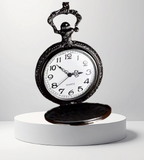BKB Custom Gifts black alloy pocket watch with an intricate snake design on the cover and a white quartz clock face
