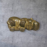BKB Custom Gifts antiqued brass hippo figurine, lying on its back, 2.4 inches long.