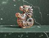 BKB Custom Gifts cute standing brass dragon figurine with detailed scales and textured finish on a green marble base.