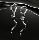 BKB Custom Gifts serpent hoop earrings with black stones and green eye accents in a sleek, elegant design.