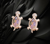 BKB Custom Gifts turtle stud earrings in rose gold-tone with colorful marquise-cut gemstones and clear stone accents.